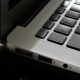 Free Detailed view of a silver laptop showing keyboard and multiple ports. Stock Photo